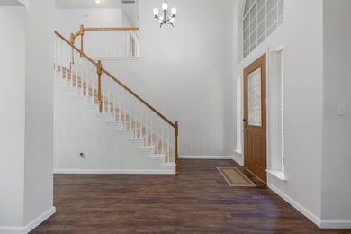 Foyer leads to living areas or upstairs.