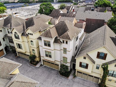 ANOTHER AERIAL VIEW SHOWING THAT THE HOME IS SECOND UNIT ON RIGHT OF COMPLEX WITH NORTH SOUTH EXPOSURE