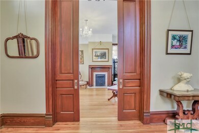 Three sets of operational pocket doors.