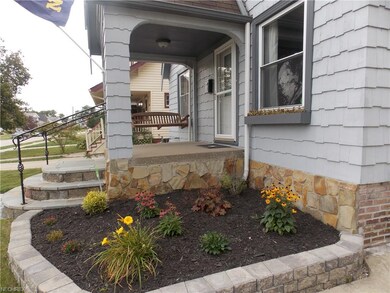 Manicured front beds with paver borders. Window fl