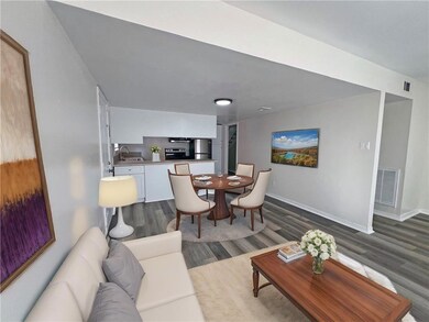 Dining/Living room is virtually staged.