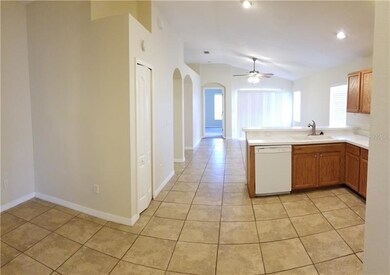 Kitchen looking into living room