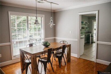 Dining area with rustic charm and modern lights