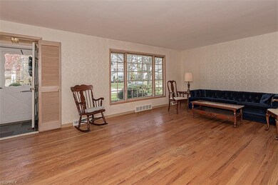 Large Living Room with Original Hardwood Flooring 