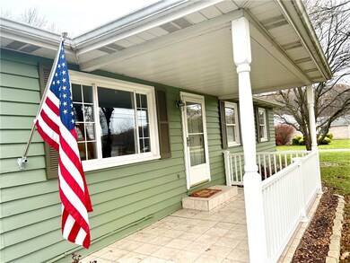 Such a cozy porch with tile flooring.  Wonderful f