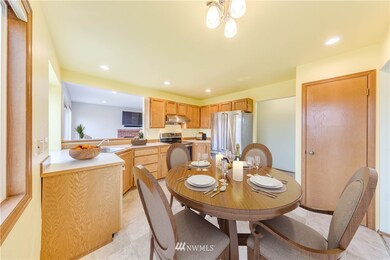Kitchen boasts stainless steel smart appliances. WIFI enabled GE Dishwasher & Convection Oven/Induction Cook-top lets you operate them from your cell phone! A huge Viking refrigerator, new canned lighting and plenty of room for your breakfast table too!
