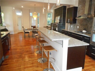 Kitchen: The kitchen island, with its espresso cab