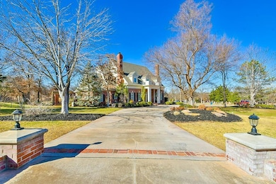 View of front of home with a chimney and a front l