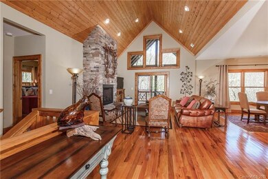 The vaulted wood ceilings and arts & crafts touche