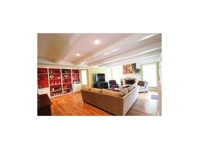 Check out this Great Room with Gleaming Hardwoods,