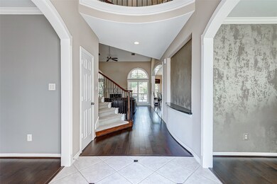 Another view of the foyer leading into the family room.