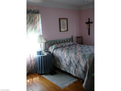 MASTER BEDROOM WITH HARDWOOD FLOORING