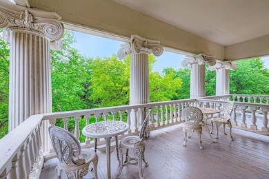 Gorgeous veranda with beautiful Corinthian columns
