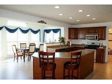 Kitchen Classic cherry cabinets and gourmet angled