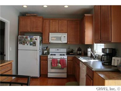 Kitchen. Door to left of kitchen leads to 1st floo