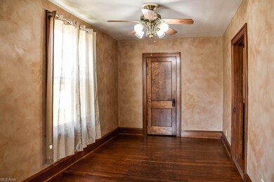 Dining room with hardwood floors and a deep closet