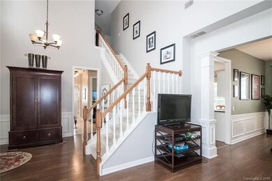 The two story foyer is open to the great room and 