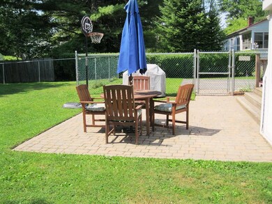 Patio area in fenced backyard