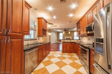 Kitchen - Travertine floors!  Upgraded cabinets