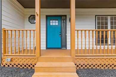Property entrance featuring a porch