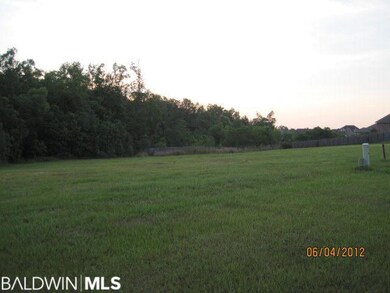 facing lot looking left, lot next door is vacant