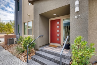 View of exterior entry featuring stucco siding