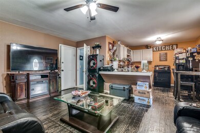 Living area featuring wood finished floors and a c