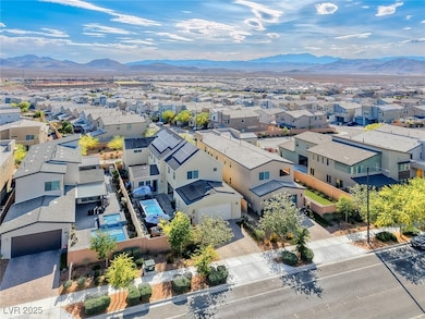 Aerial view of residential area featuring a mounta