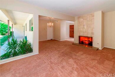 Formal Living Room and Dining Room with Fireplace 