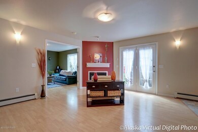 Fireplace/French doors to deck