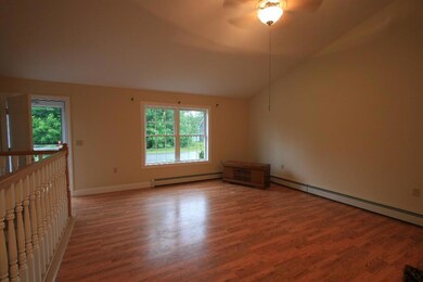 Spacious and sunny living room with...