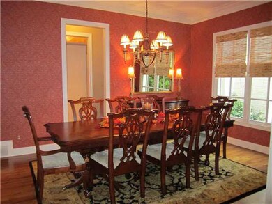 This dining room is ready for entertaining! Comple