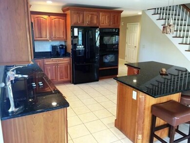 Stunning gourmet kitchen with island...