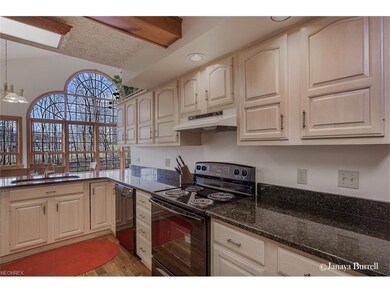 Maple Cabinetry and granite update the spacious ki