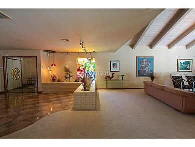 Property Photo. Custom stain glass accent in front