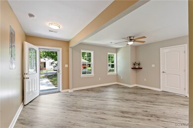 Foyer entrance featuring wood finished floors and