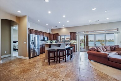 Kitchen with stainless steel fridge with ice dispe