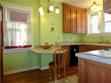 Kitchen has custom cabinetry, Corian counter top, 