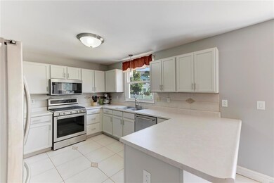Spacious kitchen with stainless steel appliances