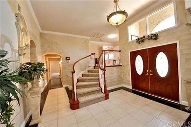 Hand-painted foyer with double door entryway and 2