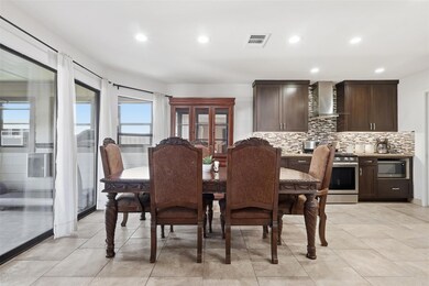 Dining space featuring recessed lighting, light t