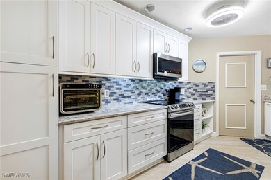 Kitchen featuring light hardwood / wood-style floo