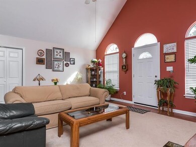 Great room with vaulted ceiling and plenty of natu
