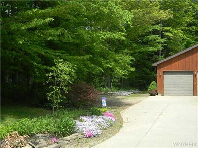 Exterior Front. Attached garage for the in law apa