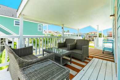 This photo showcases a charming covered porch with