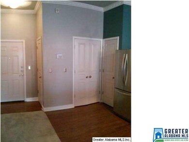 View from kitchen to front door. Laundry closet in