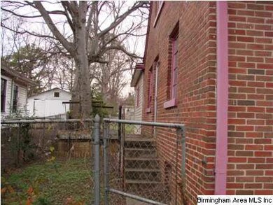 Left side, fenced bacl