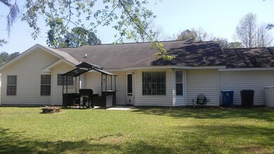 Back of home - yes there is a firepit!