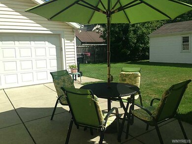 Backyard. Partially fenced yard. (neighbor is also