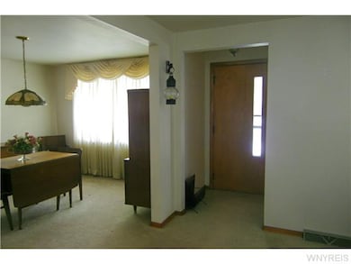Foyer Foyer with coat closet leads to living room 